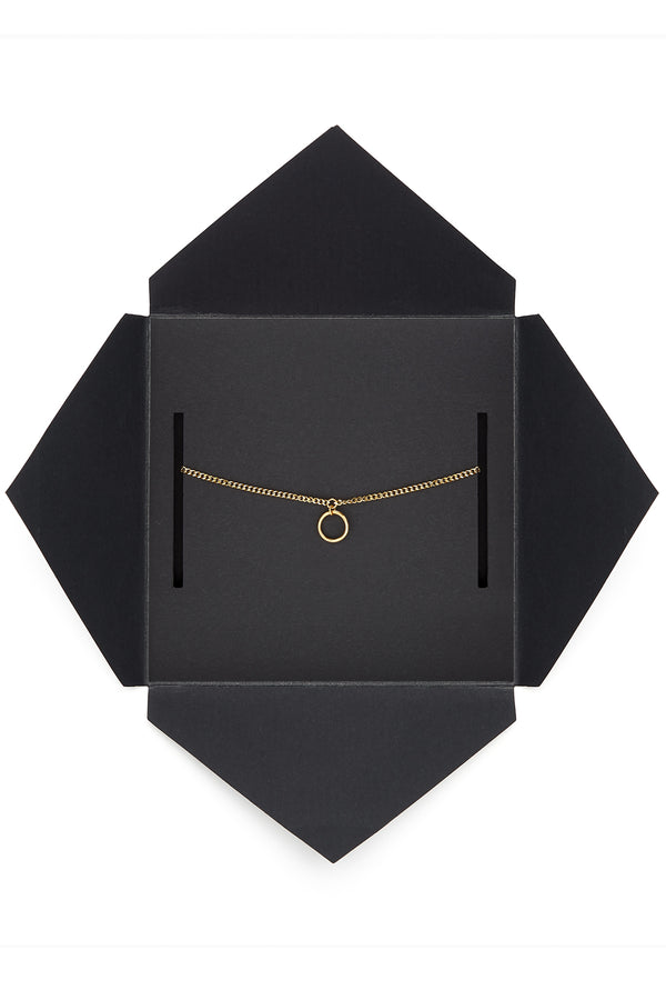 our delicate choker necklace Luke is made from 18 carat gold dipped chain. Luke is a chic piece that can be worn in or outside of the bedroom. Open view of packaging