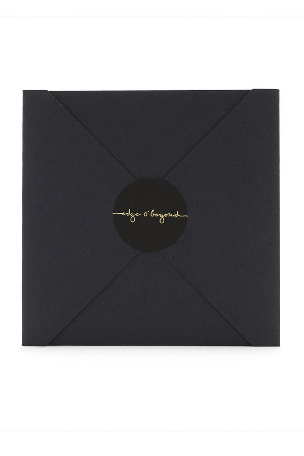 The delicate gold chains of Michael and Samuel come in their own special black and gold envelopes